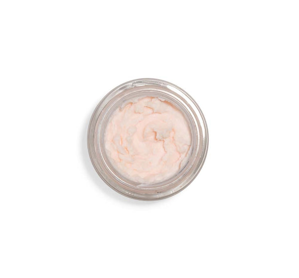 Top view of a light pink creamy mousse in a clear jar, showcasing the texture of Evening Rose Moon Dip® Ageless Facial Sleep Mousse with Peptides + Retinol | Farmhouse Fresh skincare product.