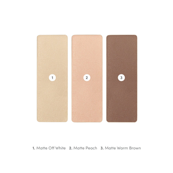 Three rectangular swatches of matte eyeshadow colors labeled 1 Matte Off White, 2 Matte Peach, and 3 Matte Warm Brown from Purepressed Eye Shadow Triple | Jane Iredale.