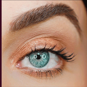 Close-up of a blue eye with neatly applied black Gel Eyeliner | Blinc, highlighting smooth, precise definition along the upper lash line and natural-looking lashes.