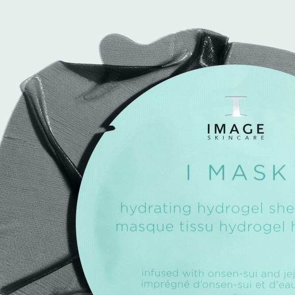Round light blue package of I MASK hydrating hydrogel sheet mask (5 pack) | IMAGE Skincare on a textured dark background, showcasing skincare product for hydration and wellness care.