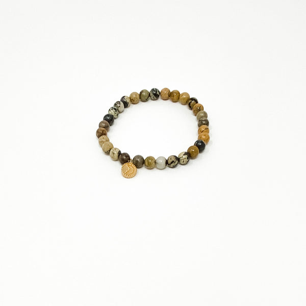 Assorted Satya Bracelets | Satya featuring natural stone beads in earthy tones with a small gold-colored charm, perfect for wellness and mindful accessory collections.