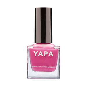 Bottle of Lily Nail Lacquer | YAPA in vibrant pink shade with black cap, designed for professional nail care and manicure use.