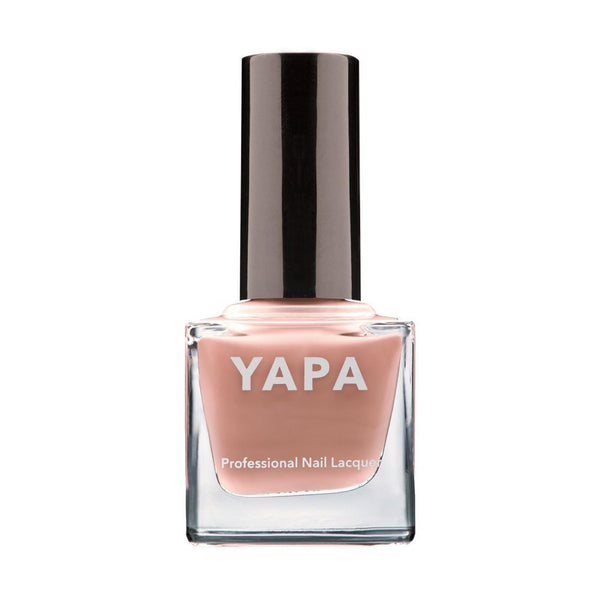 Bottle of Meghan Nail Lacquer | YAPA in a soft nude shade with a sleek black cap, designed for professional-quality nail care and beauty.