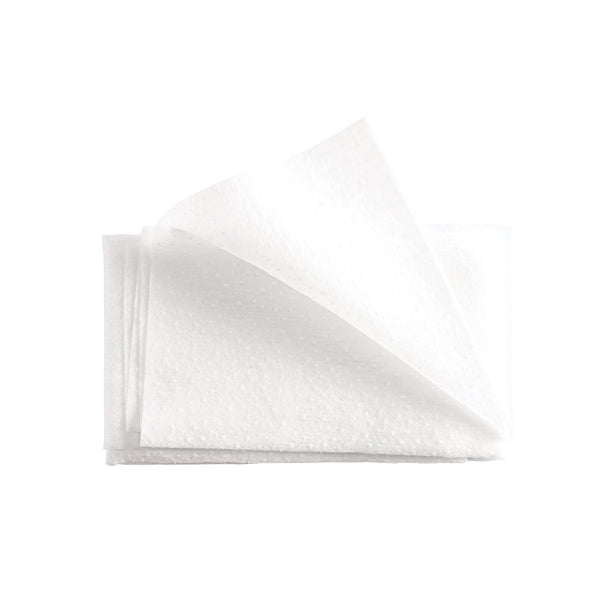 Soft white cloths layered and slightly folded, designed for gentle skincare use with Prep-N-Glow® | NuFACE devices.