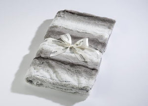 Soft plush blanket in muted lavender and gray tones neatly folded with a Sonoma Lavender branded ribbon, highlighting the cozy comfort of Blankie - Lavender | Sonoma Lavender.