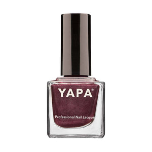 Bottle of Nicole Nail Lacquer | YAPA in a deep burgundy shade with a glossy black cap, designed for professional nail care and beauty.
