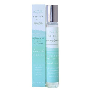 Roll-on Oil - Beach Waves Frangipani | Hydra Bloom in a clear glass bottle with silver cap next to matching pastel blue packaging, infused with flower essences for skincare.
