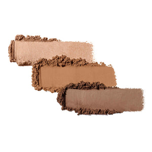 Three swatches of neutral brown shades of pressed powder eyeshadow arranged side by side, showcasing the texture and color variety of Purepressed Eye Shadow Triple | Jane Iredale.