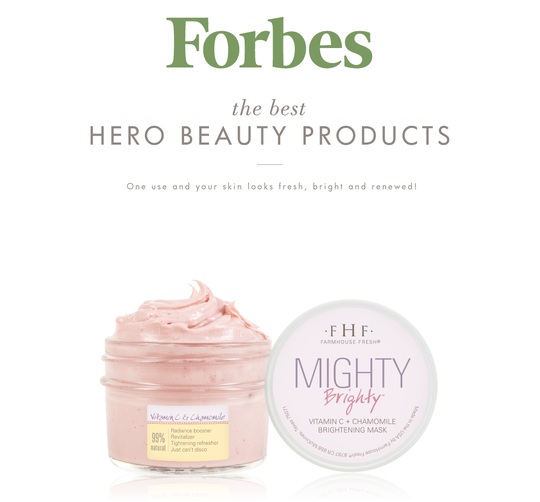 Forbes magazine features Mighty Brighty™ Vitamin C + Chamomile Brightening Mask | Farmhouse Fresh as a top hero beauty product, showing the jar with creamy pink mask inside.