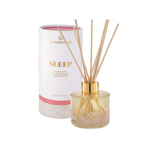 Sleep Reed Diffuser | Aluminate Life with rose quartz crystals inside a glass bottle and natural reed sticks, designed for enhancing wellness and creating a calming atmosphere.
