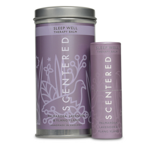 Sleep Well Therapy Balm | Scentered in lavender and ylang ylang with palmarosa, displayed in a purple container and cylindrical tin for skincare and wellness use.