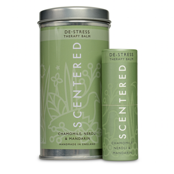 De-Stress Therapy Balm | Scentered in green packaging with chamomile, neroli, and mandarin, designed for skincare and wellness, shown in a tin and stick form.