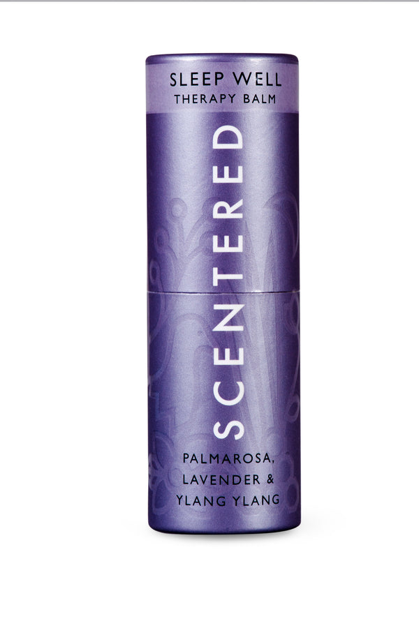 Sleep Well Therapy Balm | Scentered in a purple cylindrical container with calming palmarosa, lavender, and ylang ylang scents, designed for skincare and wellness.