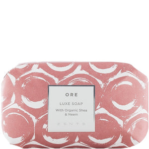 Luxe Soap Bar | Zents wrapped in artistic pink and white patterned paper, highlighting organic shea and neem ingredients for premium skincare and body care.