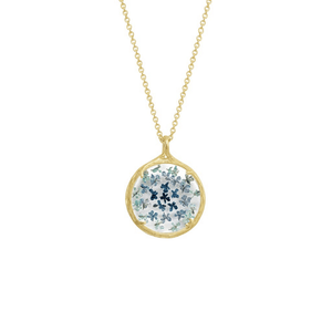 Small Ombre Botanical Necklace | Catherine Weitzman Jewelry featuring delicate blue and green ombre floral design encased in a round gold pendant on a fine gold chain.