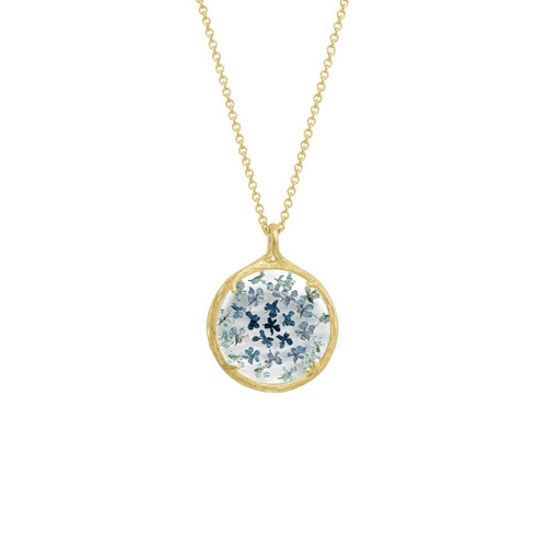Small Ombre Botanical Necklace | Catherine Weitzman Jewelry featuring delicate blue and green ombre floral design encased in a round gold pendant on a fine gold chain.