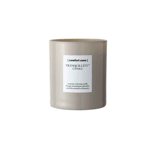 Minimalist ceramic candle in neutral taupe with white label, featuring the Tranquillity Candle | [ comfort zone ] for a calming and aromatic wellness experience.