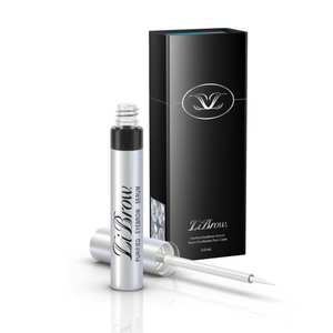 Sleek silver tube with applicator brush next to glossy black box packaging of LiBrow® Purified Eyebrow Serum (3 & 6 Month Supply) | LiLash Beauty for skincare and eyebrow enhancement.