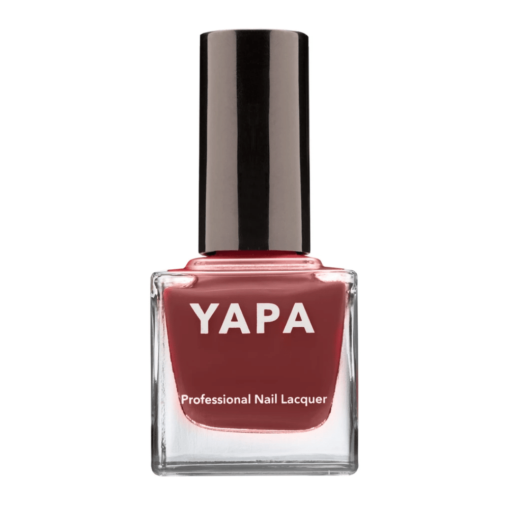 Bottle of Maria Nail Lacquer | YAPA in a rich, warm rose shade with a glossy black cap, designed for professional nail care and beauty.