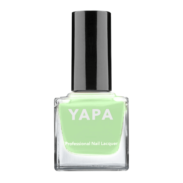 Bottle of pale green nail polish with black cap labeled Erin Nail Lacquer | YAPA and YAPA Professional Nail Lacquer on the front