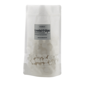 Clear resealable bag containing multiple white compressed Essential Wipes PRO Pak - 350 qty | Functional Botanicals tablets for skincare and body care purposes.