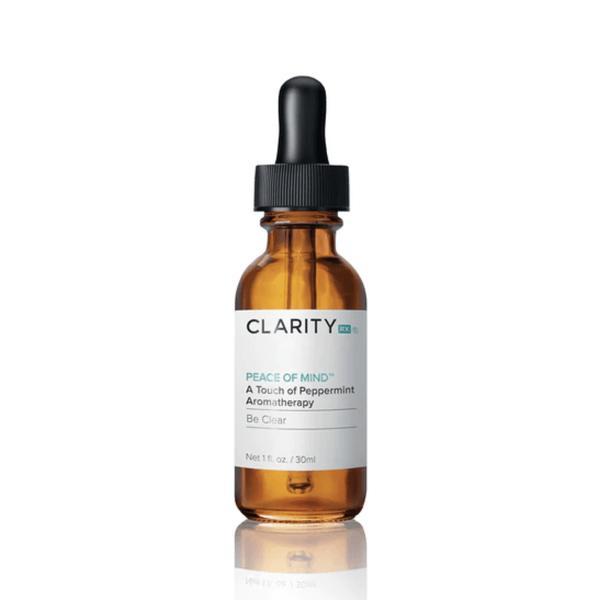 Amber dropper bottle labeled Peace Of Mind™ Be Clear | ClarityRx with peppermint aromatherapy for skincare and wellness supplements.