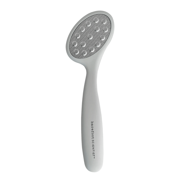 Smooth Things Over | Barefoot Scientist foot file with ergonomic white handle and textured gray abrasive surface for effective skin smoothing and care.