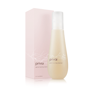Gentle Foaming Cleanser | Privai in a sleek, light beige bottle with a white cap, shown alongside its soft pink box, highlighting a skincare product for gentle cleansing.