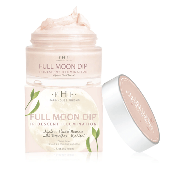 Full Moon Dip® Iridescent Illumination Ageless Facial Mousse with Peptides + Retinol | Farmhouse Fresh in an open jar showing light pink mousse, highlighting skincare and wellness benefits.