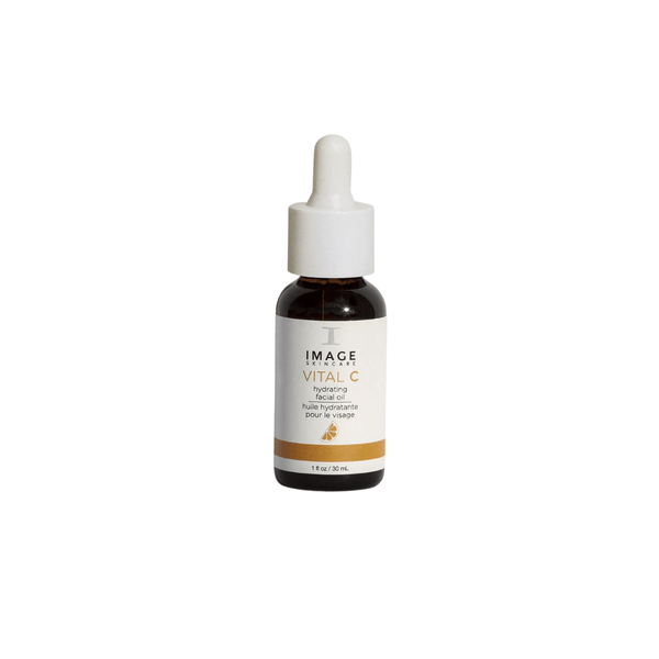 Bottle of VITAL C hydrating facial oil | IMAGE Skincare with dropper cap, designed for skincare and hydration.