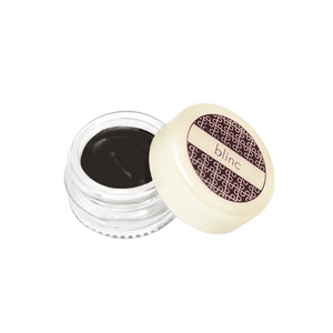 Open jar of black gel eyeliner in clear container with cream-colored lid featuring patterned design and blinc logo, showcasing Gel Eyeliner | Blinc product.