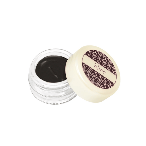 Open jar of black gel eyeliner in clear container with cream-colored lid featuring patterned design and blinc logo, showcasing Gel Eyeliner | Blinc product.