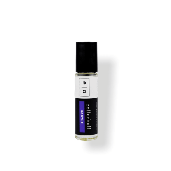 Soothe Rollerball - Abdominal Support | Essence One in a clear glass bottle with black cap, designed for wellness and body care support with a rollerball applicator.