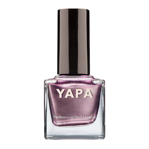 Bottle of Bella Nail Lacquer | YAPA in a shimmering metallic purple shade with a black cap, showcasing professional quality nail polish for a stylish manicure.