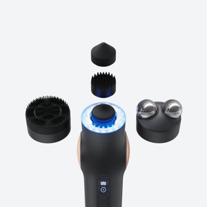 TheraFace PRO | Therabody device with four detachable black attachments designed for skincare and facial wellness, including cleansing, massage, and toning functions.