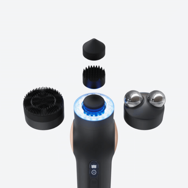 TheraFace PRO | Therabody device with four detachable black attachments designed for skincare and facial wellness, including cleansing, massage, and toning functions.