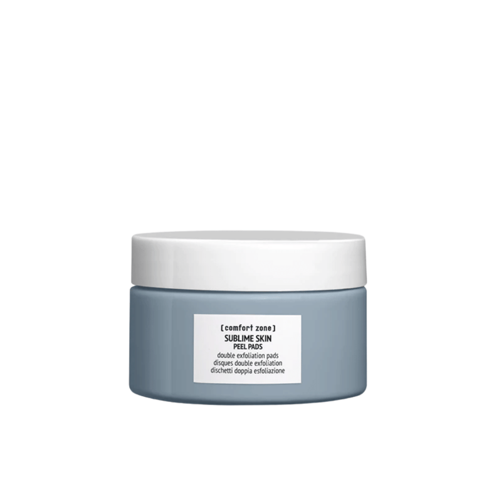Sleek gray jar with white lid containing Sublime Skin Peel Pads | [ comfort zone ], designed for gentle double exfoliation in skincare routine.