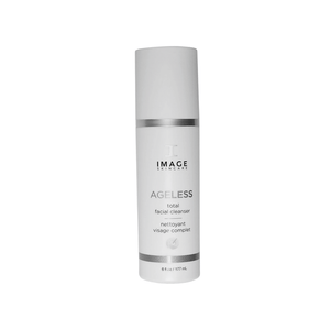 Bottle of AGELESS total facial cleanser | IMAGE Skincare with minimalist white design and silver accents, highlighting skincare and facial cleansing features.