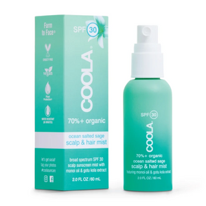 Scalp & Hair Mist Organic Sunscreen SPF 30 | COOLA in a green spray bottle with matching box, featuring ocean salted sage scent and organic ingredients for scalp and hair sun protection.