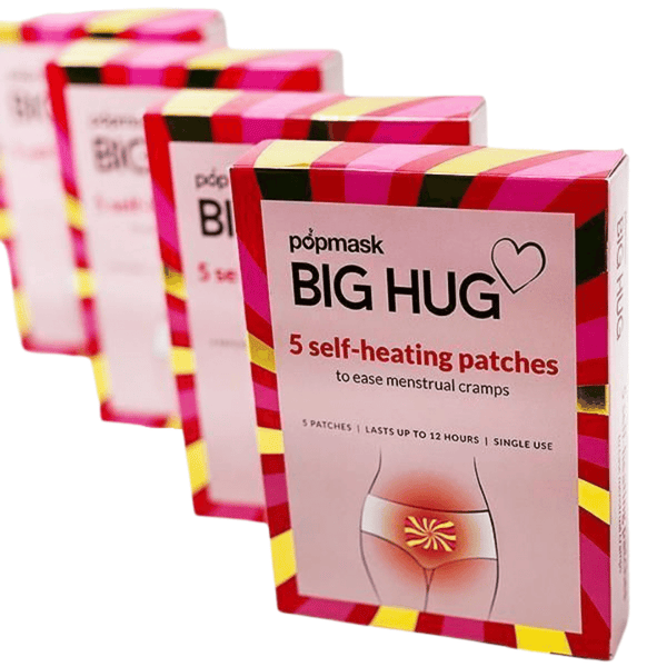 Big Hug - 5 Pack | Popmask showing self-heating patches designed to ease menstrual cramps with packaging in bright pink, red, black, and yellow stripes.