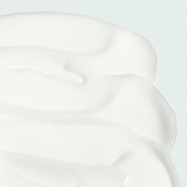 Close-up of smooth, creamy white gel texture for VITAL C hydrating eye recovery gel | IMAGE Skincare, highlighting its moisturizing and soothing skincare properties.