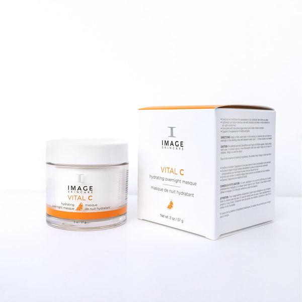 Jar and box packaging of VITAL C hydrating overnight masque | IMAGE Skincare displayed on a white background, showcasing skincare product designed for overnight hydration and skin renewal.