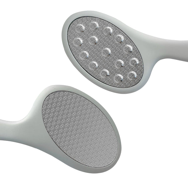 Close-up of a sleek gray foot care tool with dual textured surfaces designed for exfoliating and smoothing skin, part of the Smooth Things Over | Barefoot Scientist collection.