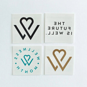 Set of four Wellness Month Tattoos | Wellness Month featuring heart and W designs in black, teal, and gold with the phrase "The future is well" on white background.