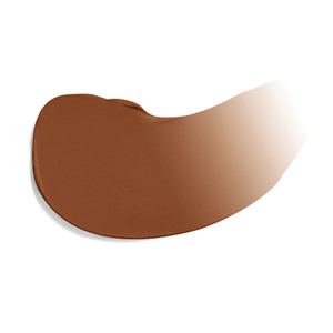 Swatch of rich brown tinted moisturizer showcasing smooth, creamy texture for natural skin coverage and hydration in Dream Tine Tinted Moisturizer SPF 15 | Jane Iredale.