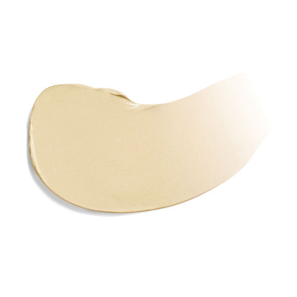Creamy beige smear of Dream Tine Tinted Moisturizer SPF 15 | Jane Iredale showcasing smooth texture for natural skincare and light coverage benefits.