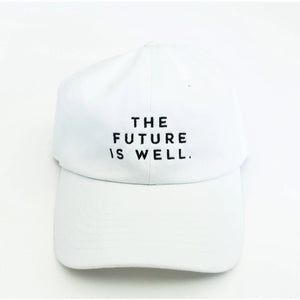 White dad hat with black embroidered text "THE FUTURE IS WELL." front centered, featuring the product title Wellness Month Dad Hat - Future is Well - White | Wellness Month