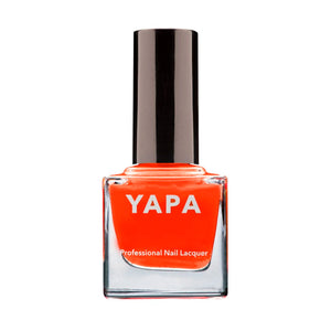 Bright orange professional nail lacquer bottle with black cap labeled YAPA, showcasing the Tamra Nail Lacquer | YAPA for vibrant nail color.