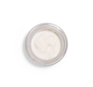 Top view of creamy white texture in a jar of Three Milk Ageless Sleep Cream with Peptides | Farmhouse Fresh, a skincare product designed for overnight hydration and renewal.